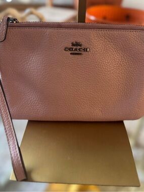 COACH Pebbled Leather Wristlet in Rose Blush